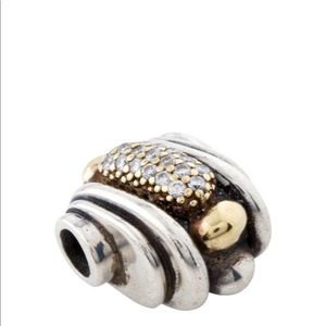 LAGOS sterling silver pendant with gold accents and diamonds.